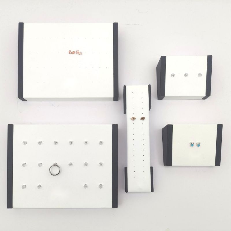 Factory-crafted custom logo PU leather stud display set with a desktop stud display stand